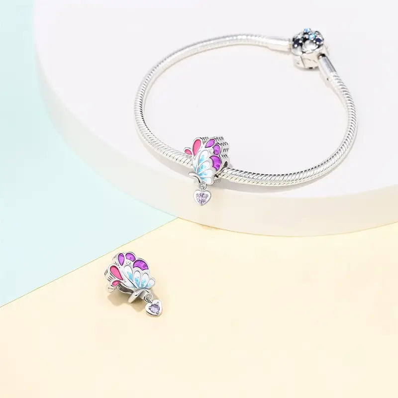 Mariposa de la Armonía y Corazón Morado