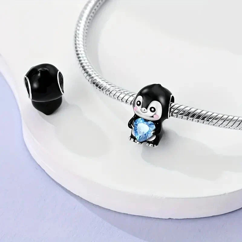 Pingüino y Corazón Azul