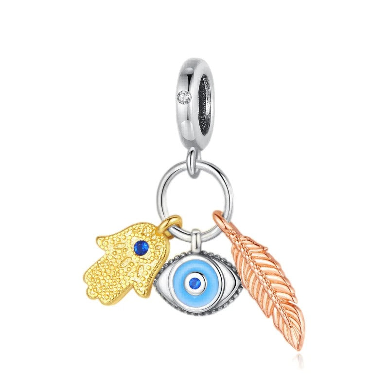 Hamsa, Ojo Nazar y Pluma